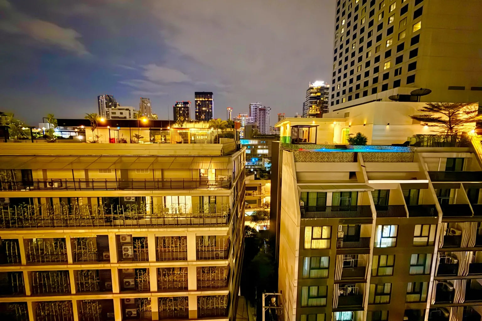 Bangkok high rise condominium buildings at night earthquake preparedness Thailand