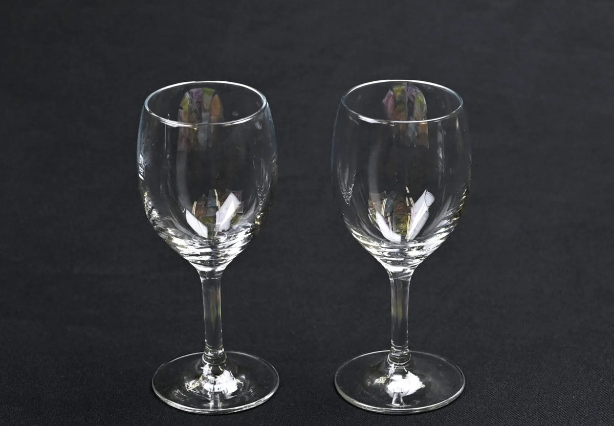 Two clear glasses representing purity and clarity, symbolizing clean and smooth soft water like Japanese drinking water.
