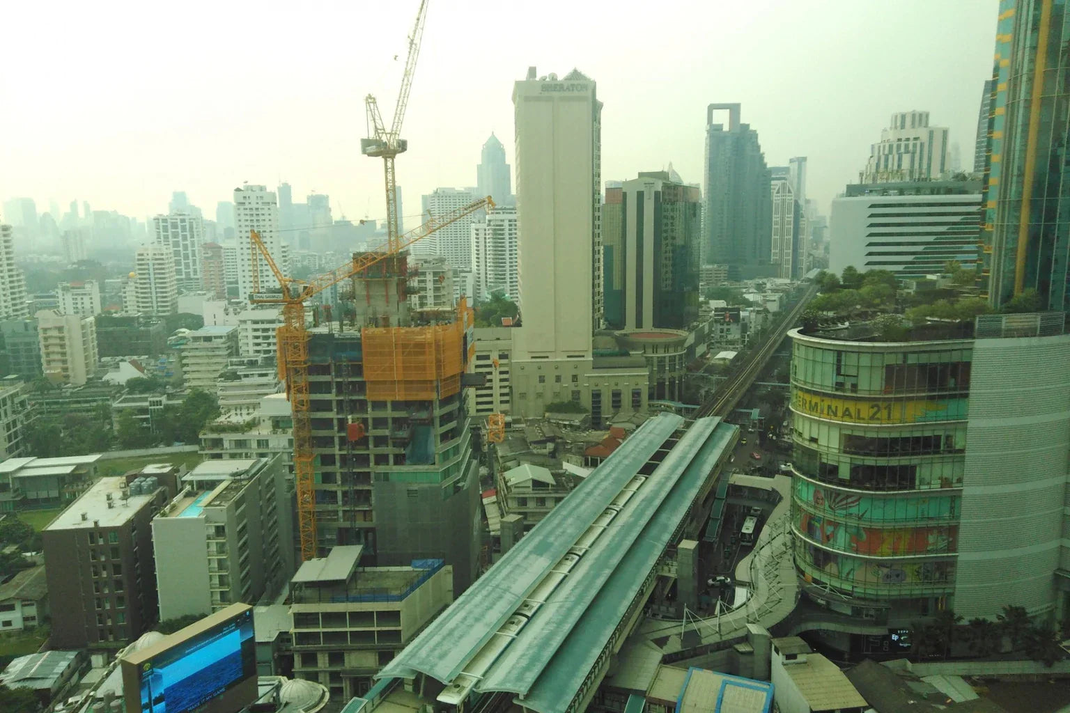 Bangkok Asok district with BTS station and Terminal 21 cityscape