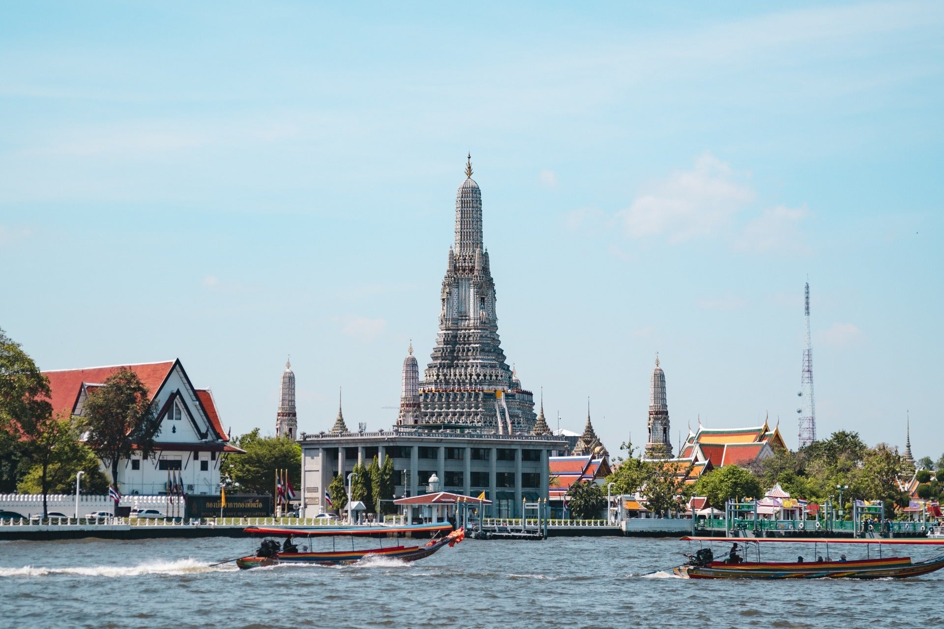 Wat Arun riverside landmark under blue sky in Bangkok Thailand
