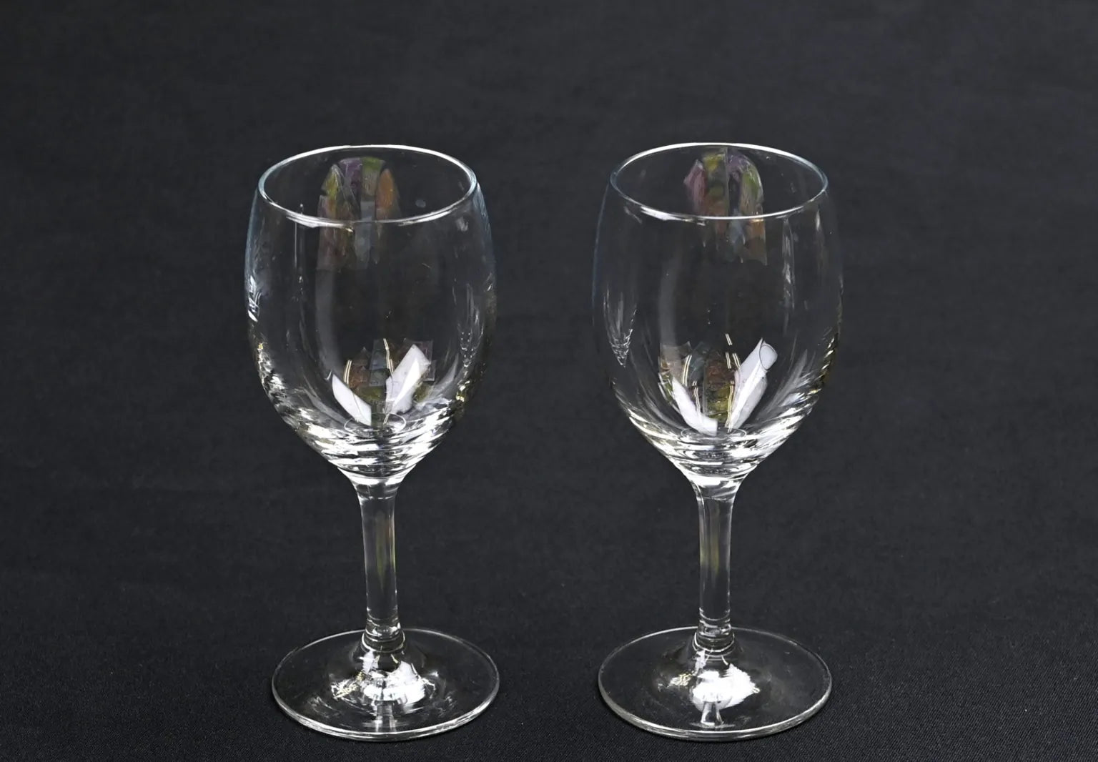 Two clear glasses representing purity and clarity, symbolizing clean and smooth soft water like Japanese drinking water.